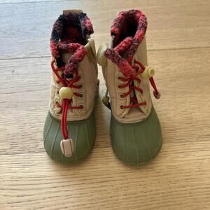 Tan and green babies boots